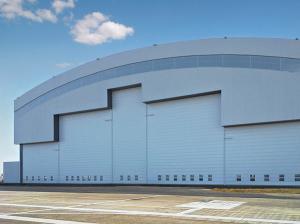 Buy cheap Prefab Curve Roofing System Steel Aircraft Hangars With Electrical Slide Doors product