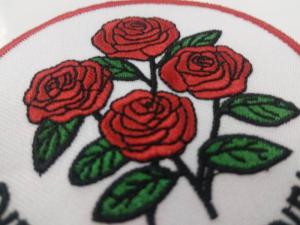 Buy cheap custom design logo red rose round embroidery patch for clothing product