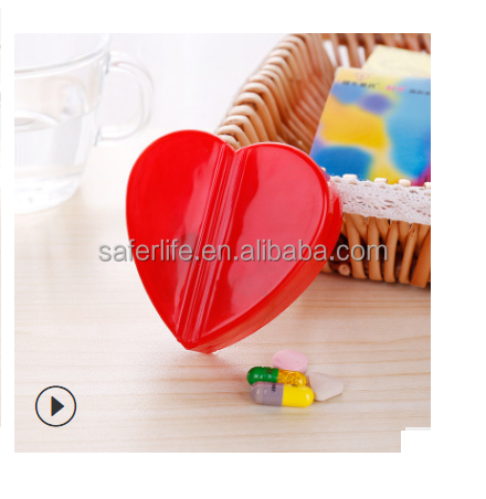 Can rotation Cute Heart shape pill box with four compartments and can changed it with oval shape pill holder