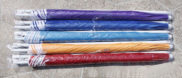 5.9ft beach umbrella in use at outdoor event
