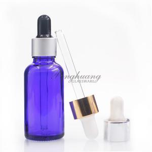 China Cylindrical 30ml Blue Oil Dropper Glass Bottle With Gold Dropper on sale