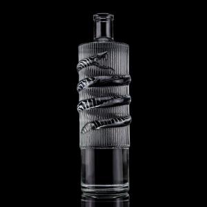 Buy cheap Customized Logo Clear 750ml Bar Top Emossed Snake Drawing Glass Bottle for Vodka Cylinder product